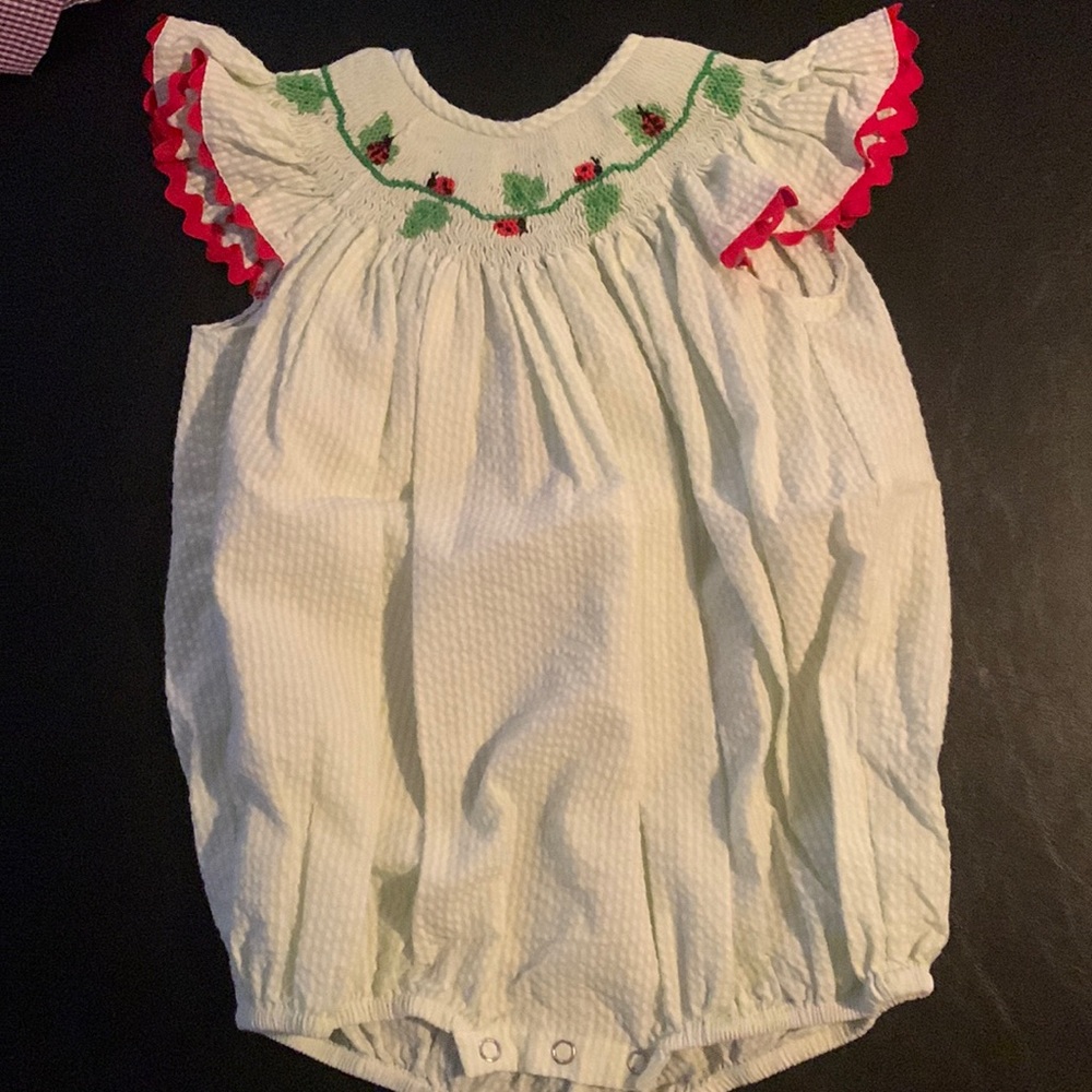 18 month green smock onesie.